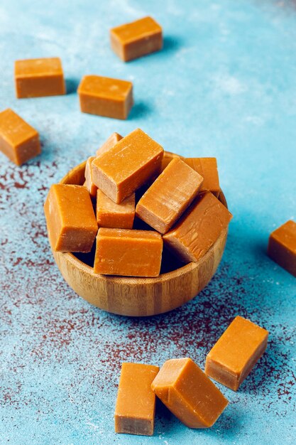 Tasty salty caramel fudge candies with sea salt,top view