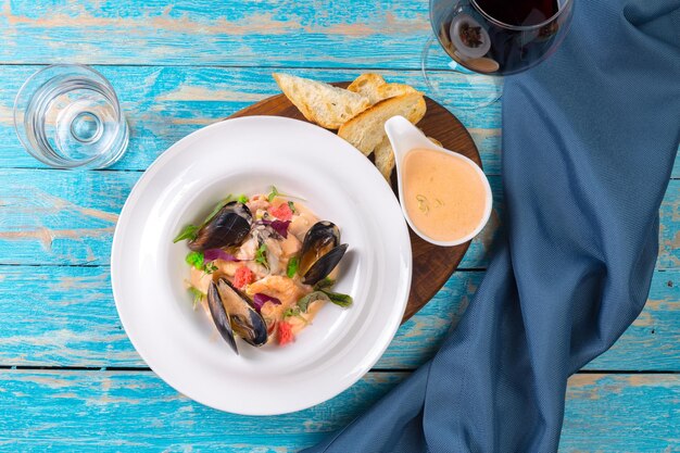 Tasty seafood on plate on table close-up