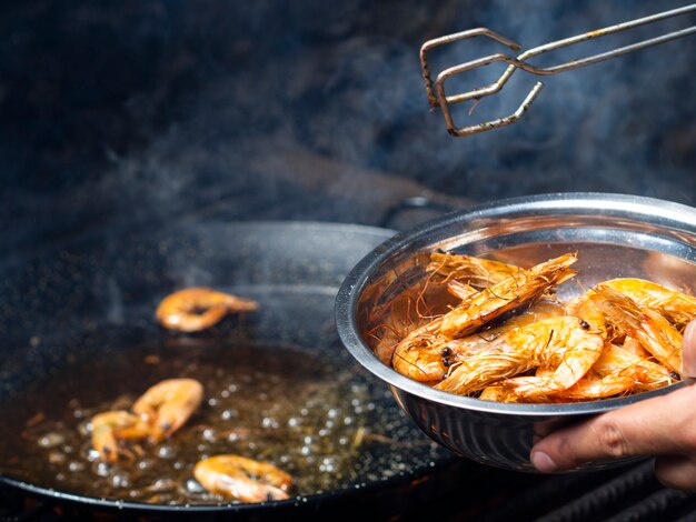 Tasty shrimps fried on pan