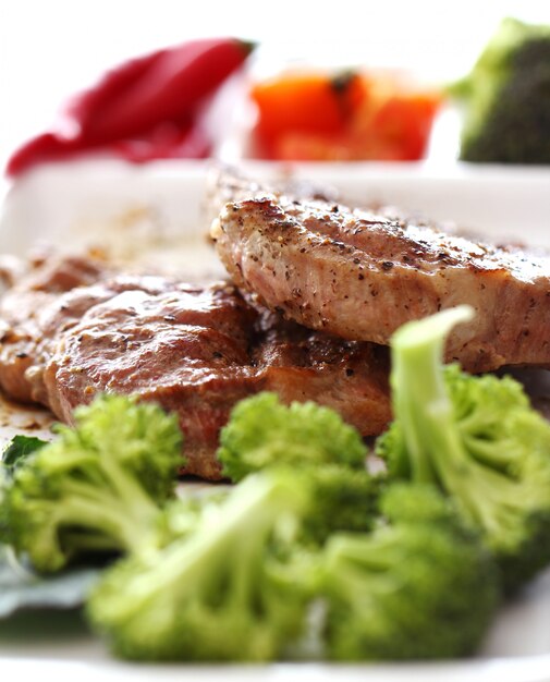 Tasty steak with vegetables