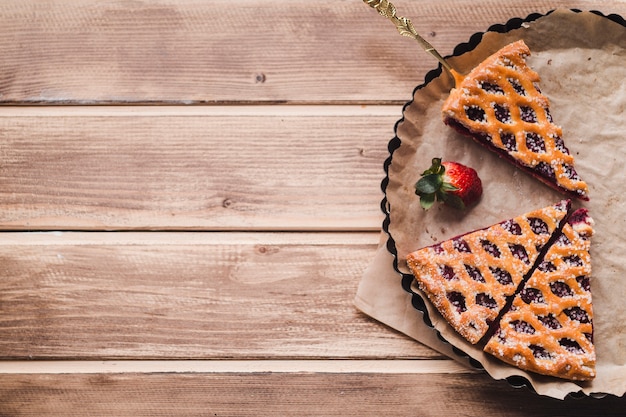 Tasty tart serving on baking dish