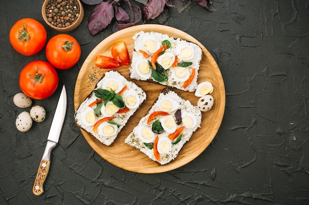 Free photo tasty tartines with eggs