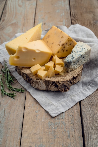 Tasty traditional assortment of cheese on the table