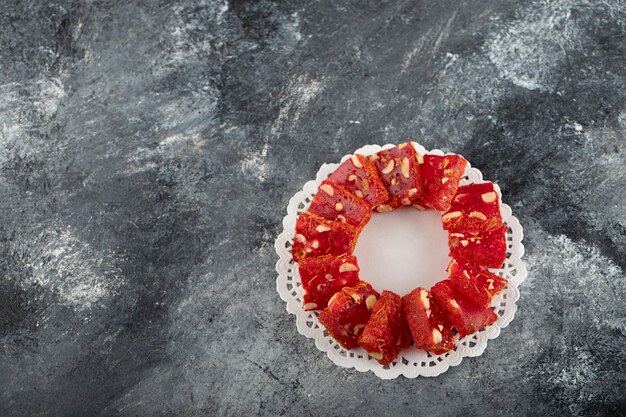 Tasty Turkish delight on a marble surface. 