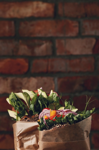 Free photo tasty vegan sandwich over wooden table