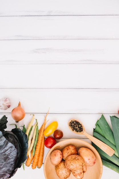 Tasty vegetables on white tabletop