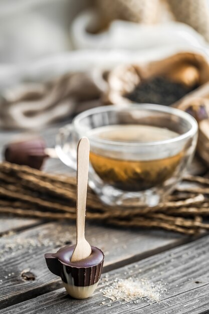 tea and chocolate candy on a stick