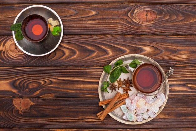 Tea cup with Turkish delight on big plate