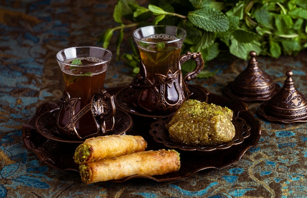 Tea cups assortment with food