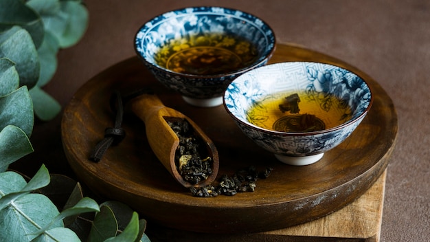 Tea cups and herbs assortment