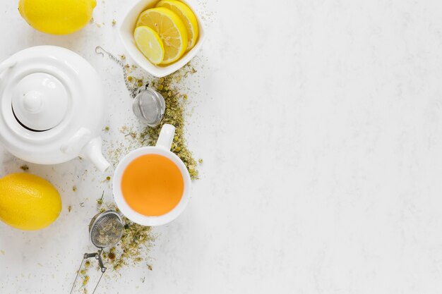 Tea pot with copy space on white table