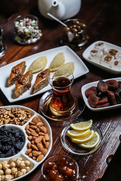 Tea set with nuts and snacks