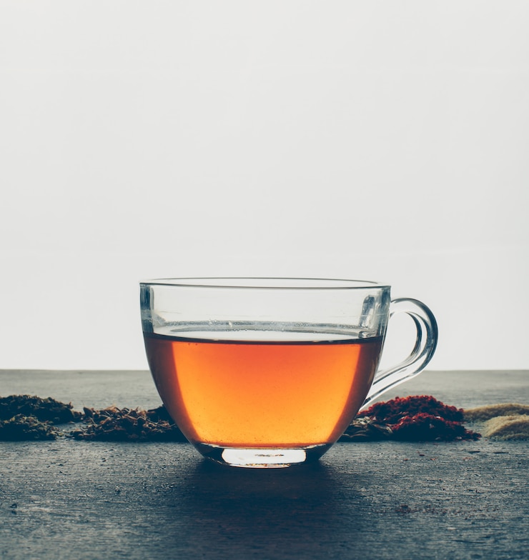 Free Photo tea with dried herbs. side view.