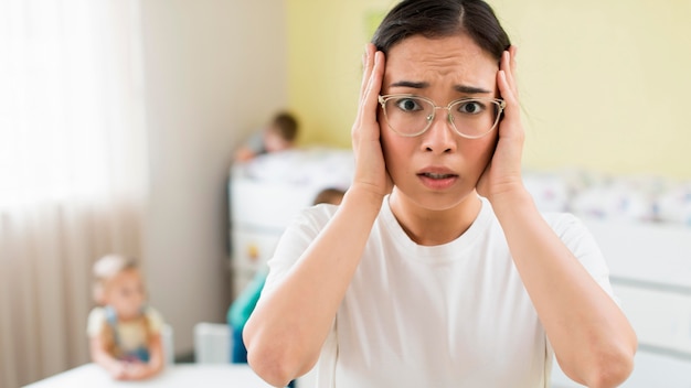 Teacher looking concerned during class