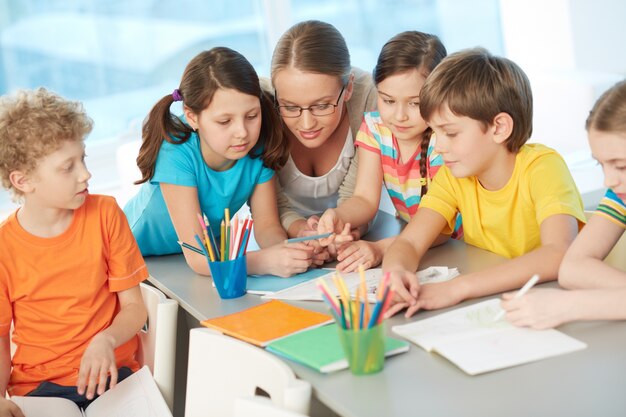 Teacher talking to students