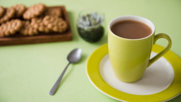 Teacup with biscuits