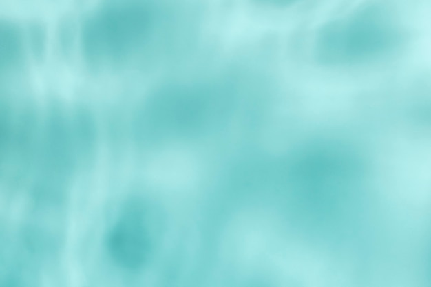 Предпосылка бирюзового цвета, текстура отражения воды. абстрактный дизайн