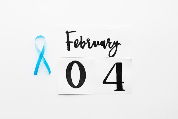 Teal ribbon near February 4 writing