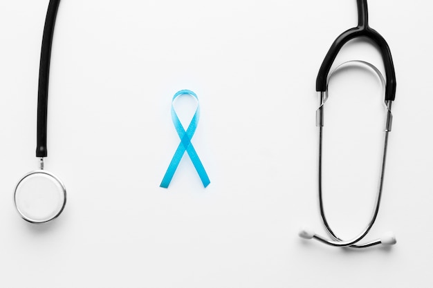 Free photo teal ribbon near stethoscope