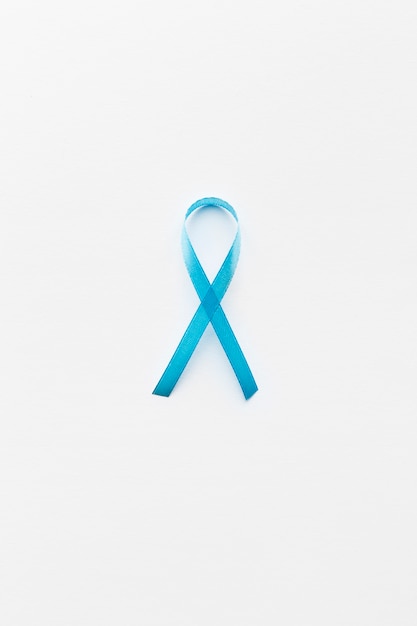 Teal ribbon on white background