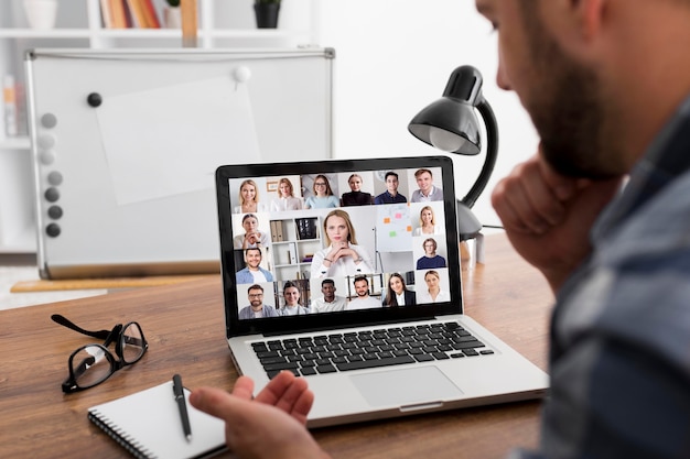 Free photo team meeting online conference call on laptop