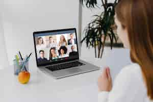 Free photo team meeting online conference call on laptop