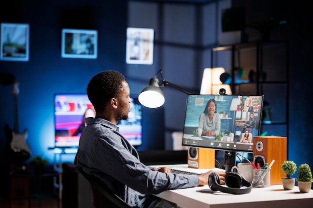 Free photo team member interacts with partners via videoconferencing