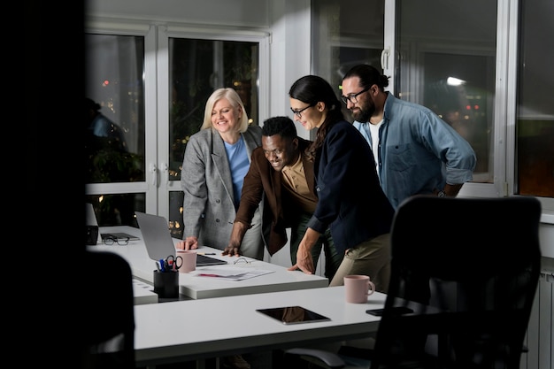 Teammates working late at the office