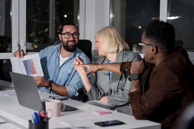 Teammates working late at the office