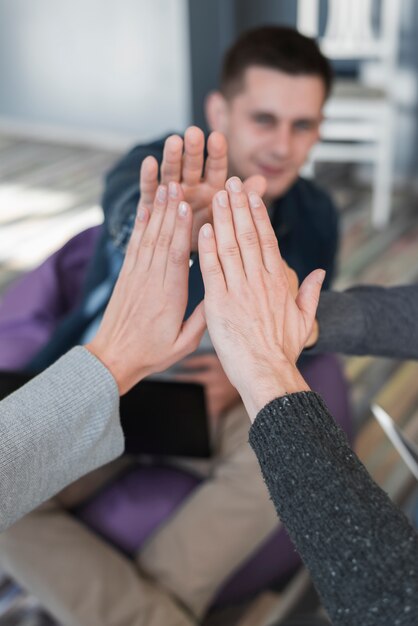 Teamwork concept with hands of group of people