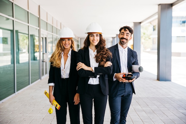 Teamwork concept with smiling architects