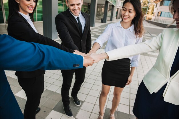 Teamwork concept with smiling business people