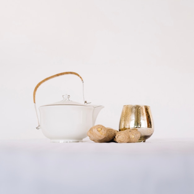 Teapot and ginger in arrangement