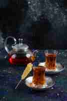 Free photo teapot and two glass tea