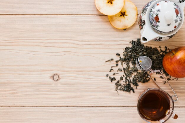 Teapot with apple and copy space