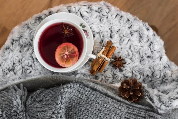 Teatime with spices on gray fluffy plaid
