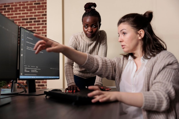 Tech engineer observing multiple system security breaches caused by overloaded storage servers. Software developers detecting cloud leak and solve it with improved application coding.