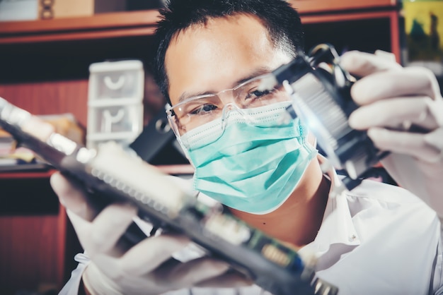 The technician repairing the computer,computer hardware, repairing, upgrade and technology