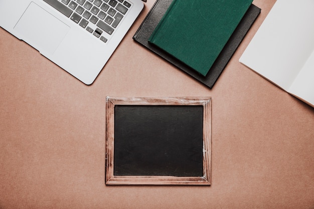 Technology and desk concept with slate on bottom