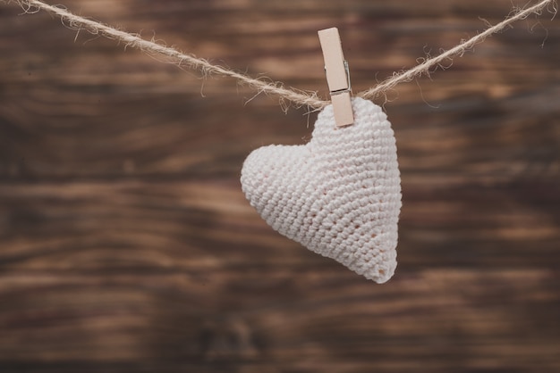 Teddy heart hanging on a rope