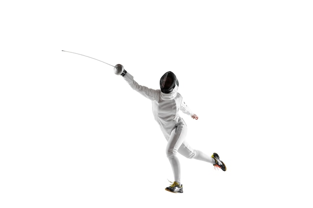 Teen girl in fencing costume with sword in hand isolated on white  background.