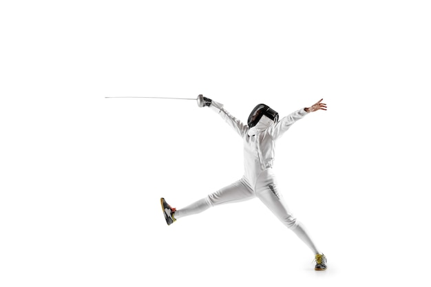 Teen girl in fencing costume with sword in hand isolated on white  background.