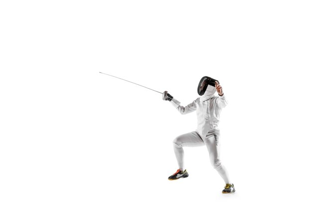 Teen girl in fencing costume with sword in hand isolated on white background