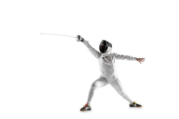 Free photo teen girl in fencing costume with sword in hand isolated on white studio background.