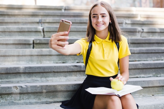 Teen girl taking selfies