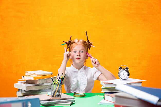 Teen girl with lot of books