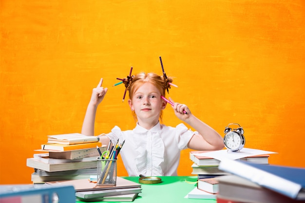 Free photo teen girl with lot of books