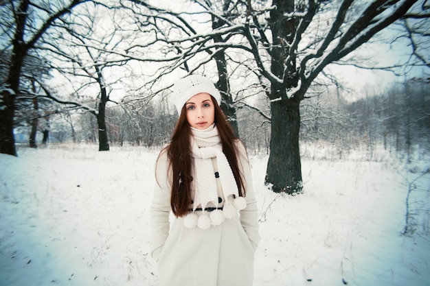 Teen wearing wool hat and scarf in cold weather