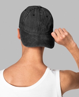 Teenage boy in black cap