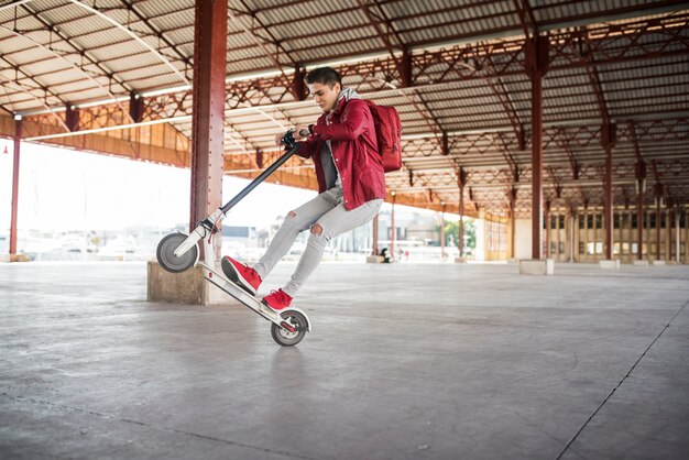 Teenage boy lifestyle concept with scooter